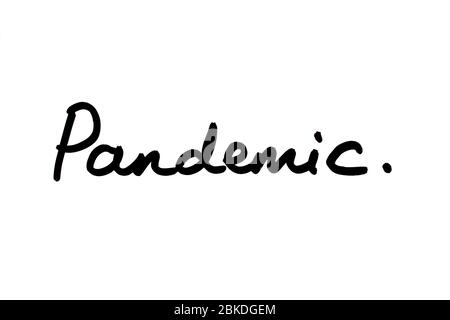 Pandemic handwritten on a white background. Stock Photo