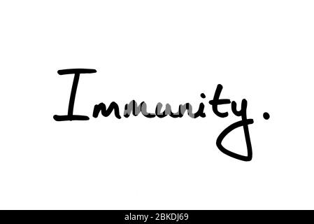 The word Immunity handwritten on a white background. Stock Photo