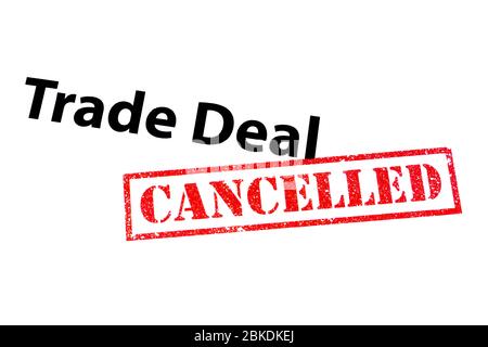 Trade Deal heading with a red CANCELLED rubber stamp. Stock Photo