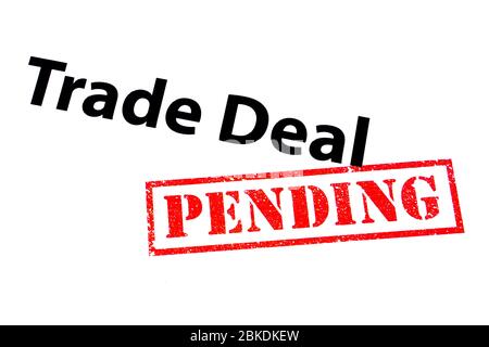 Trade Deal heading with a red PENDING rubber stamp. Stock Photo