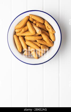 Mini bread sticks in bowl. Top view. Stock Photo
