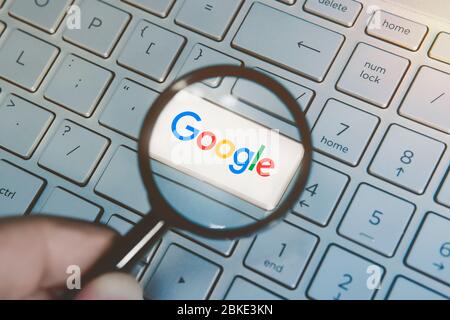 3 June 2018. Barnaul city. Russia. white button with the company logo google on the grey keyboard of a modern laptop. Stock Photo