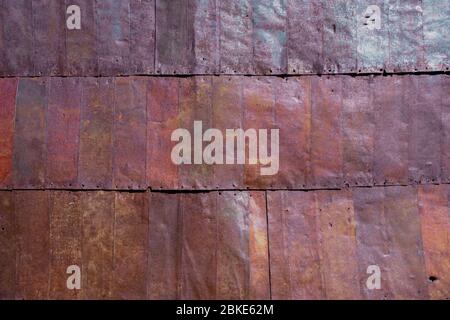 Oxidized, rusty, old, corrugated metal texture background. Stock Photo