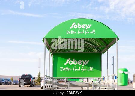 A shopping cart storage shed at Sobeys grocery store parking lot. Stores are practicing social distancing due to covid19 pandemic. Stock Photo