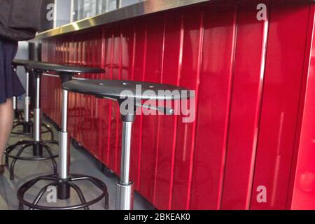 Bar chairs made from industrial tools and material Stock Photo