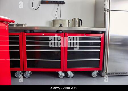 Kitchen cupboards made from industrial shelves. Stock Photo