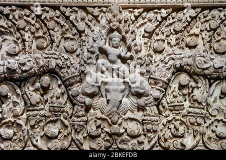 Indra riding an elephant, bas-relief on a lintel from Prasat Sralao, Angkor period 10th century, Cambodia Stock Photo