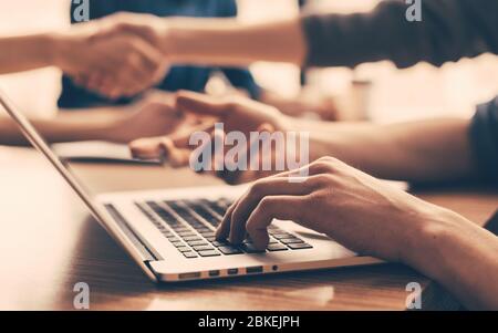 close up. business team works sitting at the office Desk Stock Photo