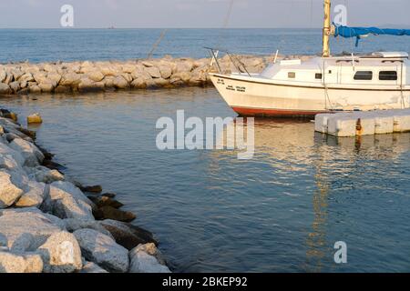 CHON BURI, THAILAND - FEBRUARY 16, 2019: Eye view the small yacht club in Pattaya. The yacht, sail is parking at the pier yacht harbour on Pattaya bea Stock Photo