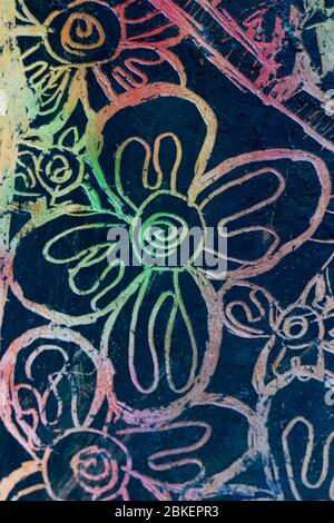 Abstract colorful floral pattern on black background. Handmade, decorative artwork, close up view. Abstract background template, wallpaper, decoration Stock Photo