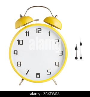 Alarm clock with no hands. Hour and minute hands separated. Isolated on white background Stock Photo