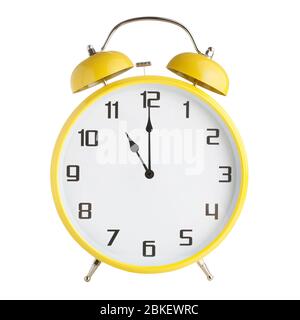 yellow clock face 11 o'clock Stock Photo - Alamy