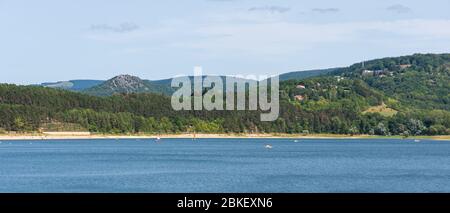 Boats on the lake of Saint-Ferreol on a sunny day Stock Photo