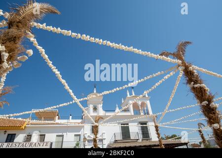 September 9, 2019, El Rocio, Andalusia, Spain. Small old town in Donana national park with sandy roads and squares, horse riding and white church Stock Photo