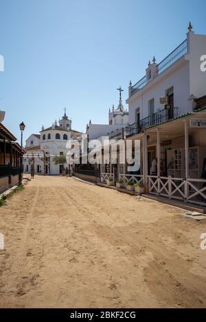 September 9, 2019, El Rocio, Andalusia, Spain. Small old town in Donana national park with sandy roads and squares, horse riding and white church Stock Photo