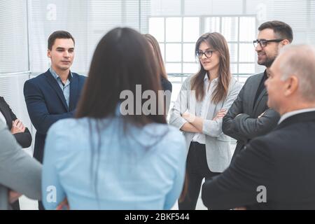 close up. a group of employees discussing new ideas Stock Photo