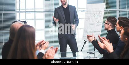business team applauds the speaker at the business presentation Stock Photo