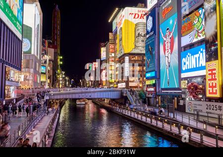 Osaka / Japan - May 21, 2018: Neon illuminated Dotonbori Canal in central Osaka, popular entertainment area and one of the main tourist destinations i Stock Photo