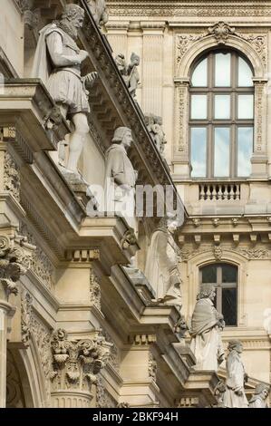 Architectural details and statues on the Richelieu Wing of the Louvre Museum,Paris, France Stock Photo