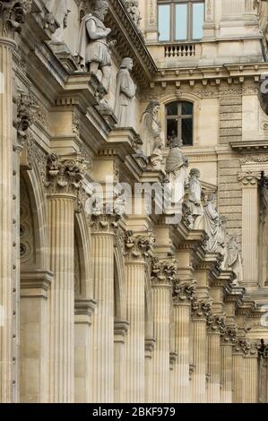 Architectural details and statues on the Richelieu Wing of the Louvre Museum,Paris, France Stock Photo