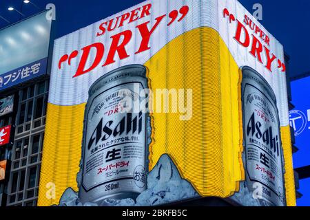 Osaka / Japan - October 1, 2017: Asahi Super Dry neon advertisement billboard at popular tourist area of Dotonbori in Osaka, Japan Stock Photo