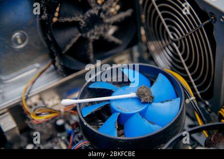 Dust on computer pc processor cooler with mainboard. concept Component maintenance. Stock Photo