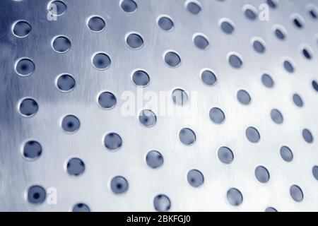 Industrial iron background in blue with professional holes and highlights. Stock Photo