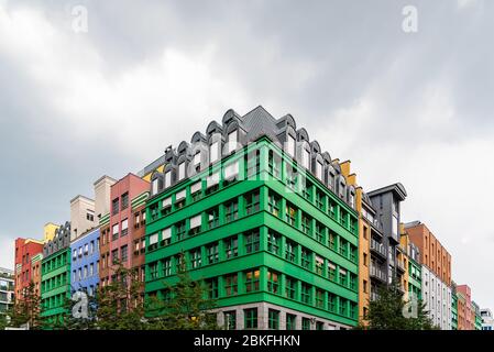 Berlin, Germany - July 29, 2019: Colorful residential buildings in Quartier Schutzenstrasse designed by italian architect Aldo Rossi Stock Photo