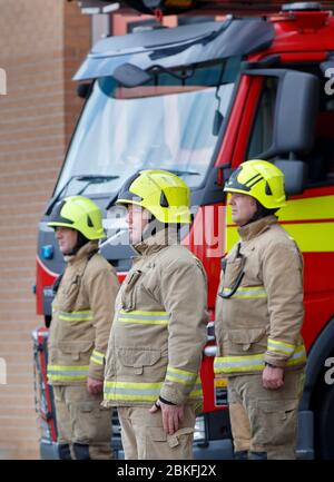 Leeds Green Watch firefighters observe a minute's silence outside Leeds ...