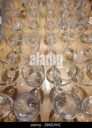 Empty glasses of champagne on the bar table. Stock Photo