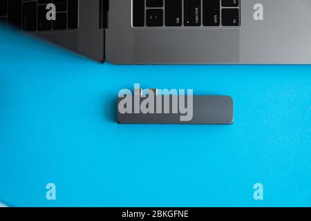 The USB adapter under the Type-C connector for laptop. Multiport station for laptop with multiple different ports. USB to USB Type-C Hub Converter Stock Photo