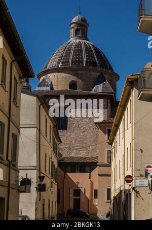 The dome of the Cathedral of Saint Feliciano rises above the streets of Foligno, a small town in Umbria, Italy Stock Photo