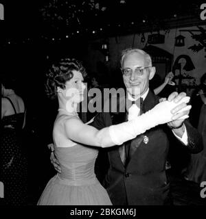 A man and woman ballroom dancing in the 1950s at a Mayors Ball in England Stock Photo