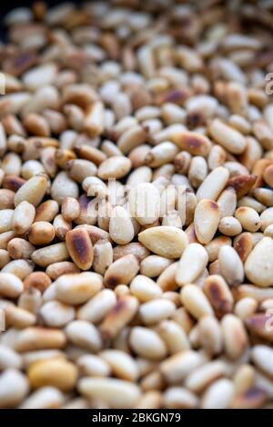 Freshly toasted pine nuts Stock Photo