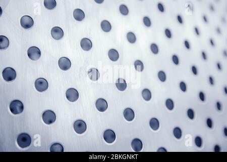 Industrial iron background in blue with professional holes and highlights. Stock Photo