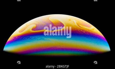 Half a soap bubble. Close-up. Black background. Bright colors. Side view. A high resolution. Imitation of an unknown planet. Children's entertainment. Stock Photo
