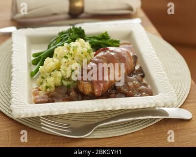 chicken wrapped in bacon Stock Photo