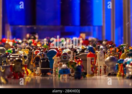 Dozens of toy robots from different eras are displayed in tight rows next to one another, as part of an exhibition at the Museum of Communication in Berlin. Leipziger Straße, Friedrichstadt, Mitte, Berlin, 10117, Germany Stock Photo