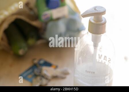Liquid soap dispenser on table Stock Photo
