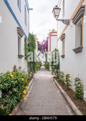 The colourful alleyways and fisherman's villages in the old district of Puerto de Mogan on the south coast of the Canary Island of Gran Canaria. Stock Photo