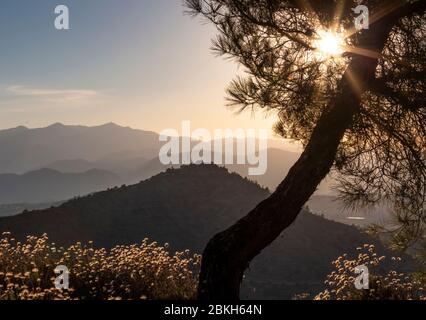 Sunset over a mountainous landscape near Stavrovouni Monastery, Lanarca, Cyprus Stock Photo