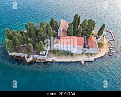 Aerial view of Sveti Dorde, Island of Saint George is one of the two islets off the coast of Perast in the Bay of Kotor, Montenegro. 09-05-2019. Bened Stock Photo