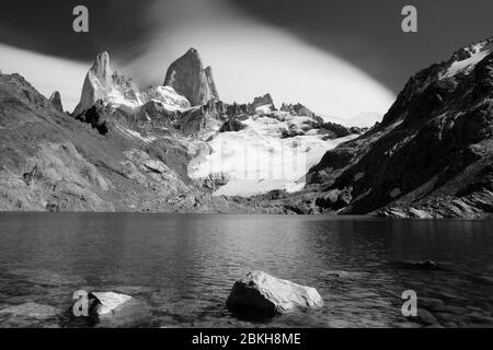 Mount Fitz Roy panorama with glacial lagoon in a black and withe picture Stock Photo