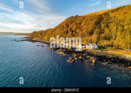 Northern Ireland, UK. Atlantic coast and Antrim Coast Road, a.k.a. Causeway Costal Route. One of the most scenic coastal roads in Europe. Aerial view Stock Photo