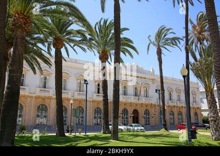 The beautiful Port Authority of Cartagena building under the palm trees, Murcia, Spain. Stock Photo