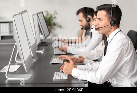 Team of technical support agents working in office Stock Photo