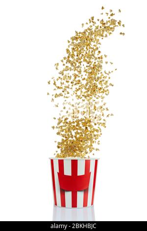 Flying popcorn from red and white paper striped bucket isolated over the white background. Cinema style popcorn Stock Photo