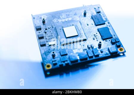 Close-up and selected focus. Microprocessor on pc motherboard on white background. Circuit Board with resistors microchips and electronic components. Stock Photo