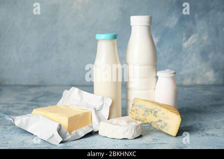 Different dairy products without lactose on color background Stock Photo