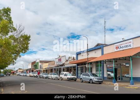 HARRISMITH, SOUTH AFRICA - MARCH 16, 2020:  A street scene, with businesses and vehicles, in Harrismith in the Free State Province Stock Photo